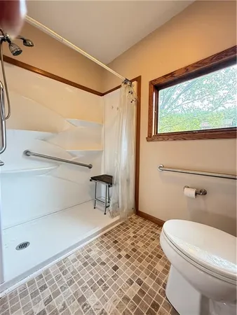 a view of a room with a large window