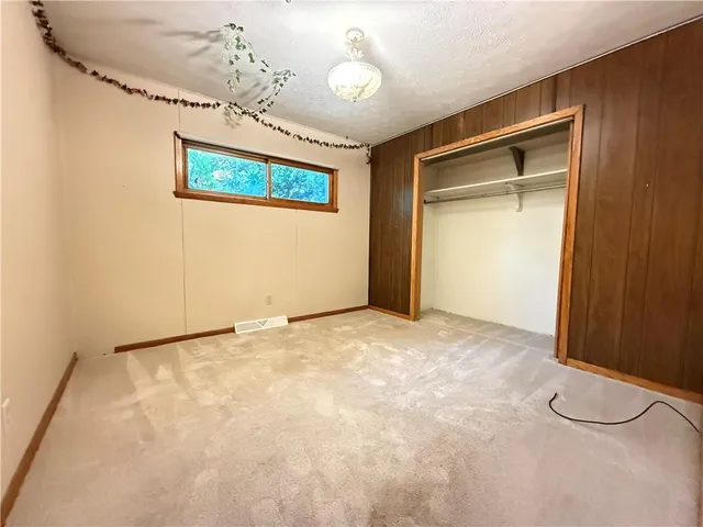 a view of a room with a large window