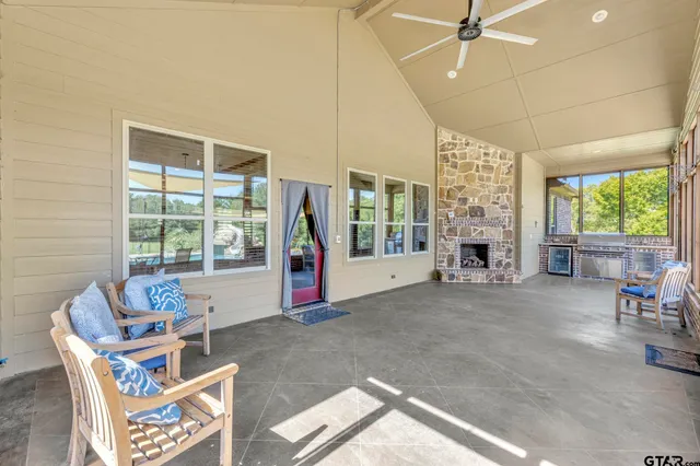 a view of a swimming pool with a patio