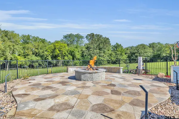 a view of a house with swimming pool and porch