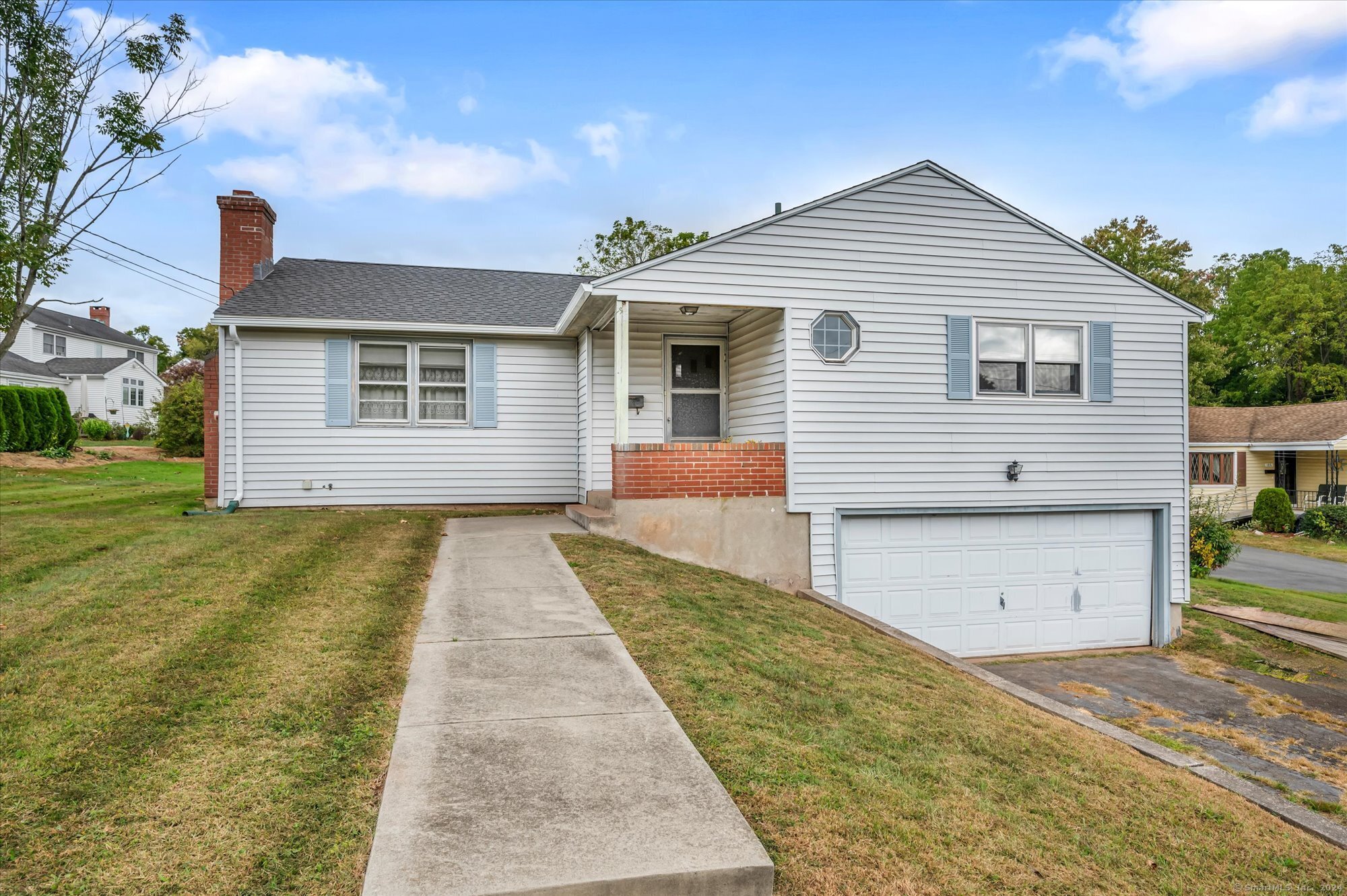 192 Morgan Circle Wethersfield, CT 06109 - Photo 1 of 1 a front view of house with yard