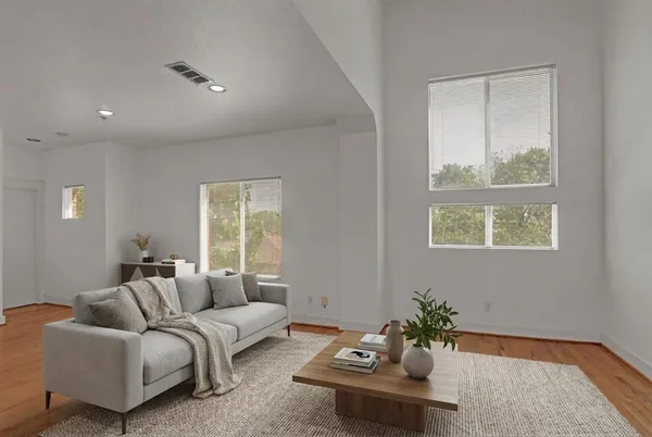 a living room with furniture and window
