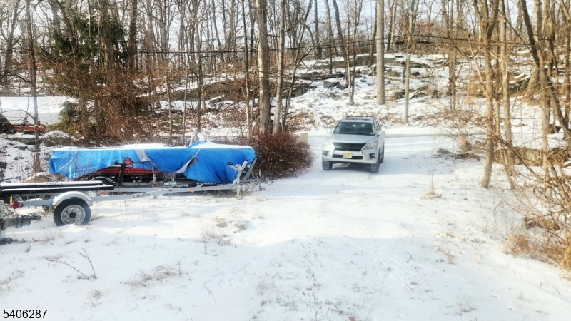 213 Squaw Trail Hopatcong, NJ 07821 - Photo 4 of 8 a swimming pool with outdoor seating