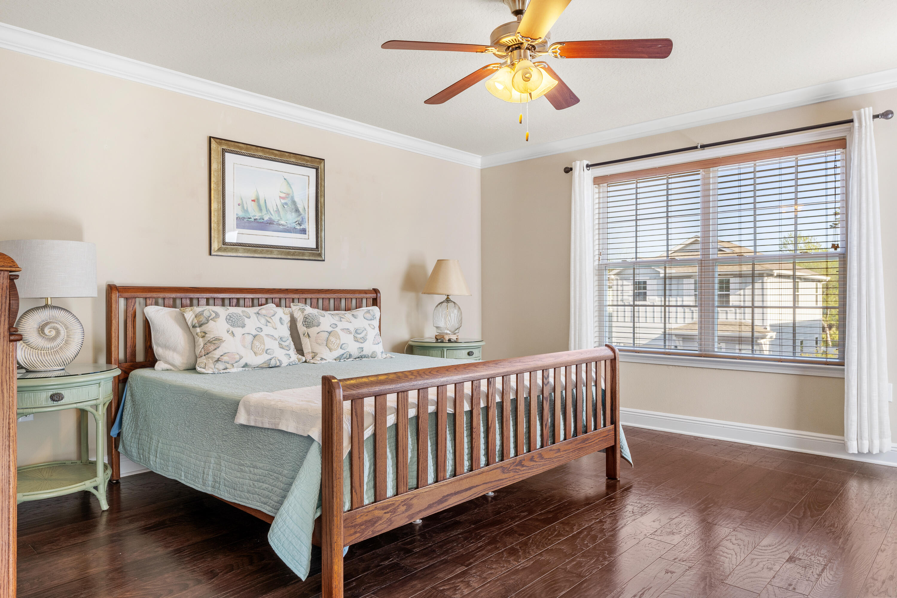 19 Topside Drive Inlet Beach, FL 32461 - Photo 20 of 40 a bedroom with a bed and a chandelier