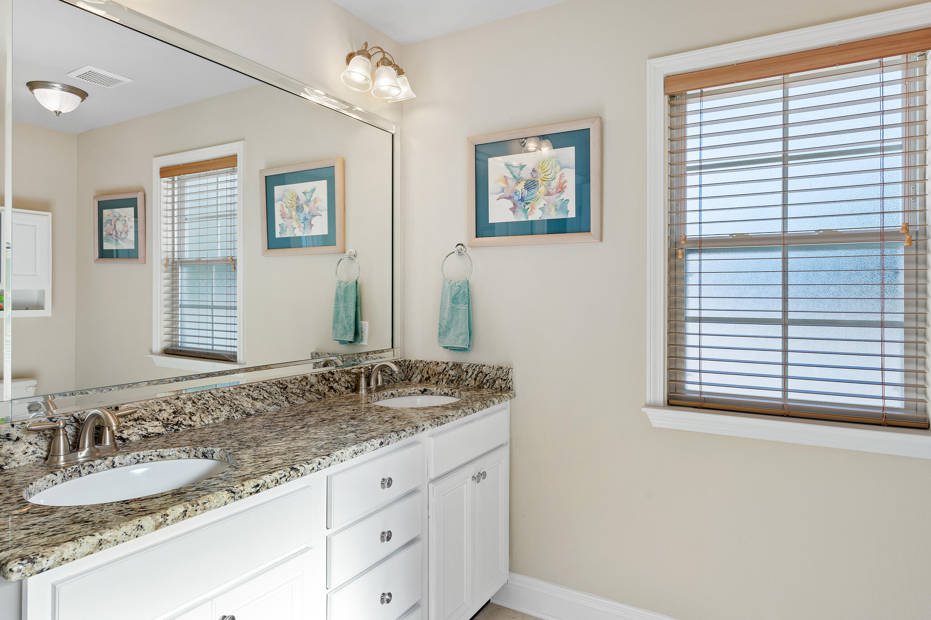 19 Topside Drive Inlet Beach, FL 32461 - Photo 23 of 40 a bathroom with a granite countertop sink and a mirror