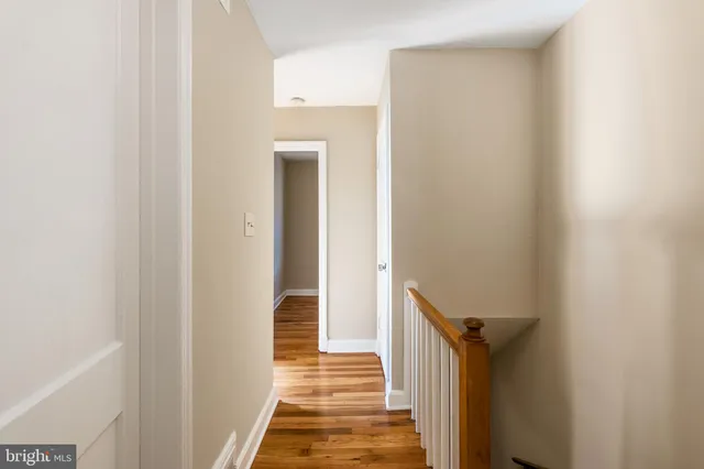 a kitchen with stainless steel appliances granite countertop a sink and a microwave