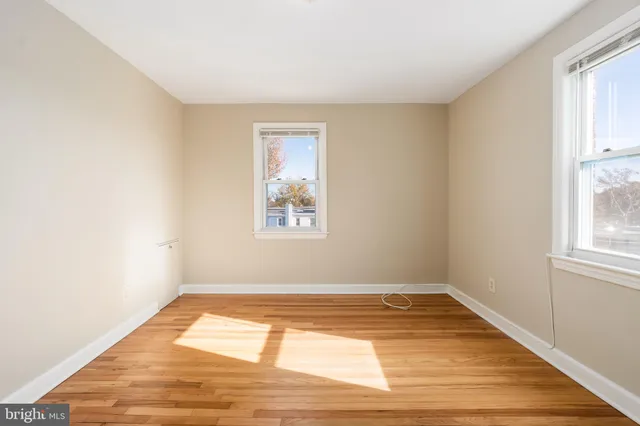 a picture of a book and a black gate