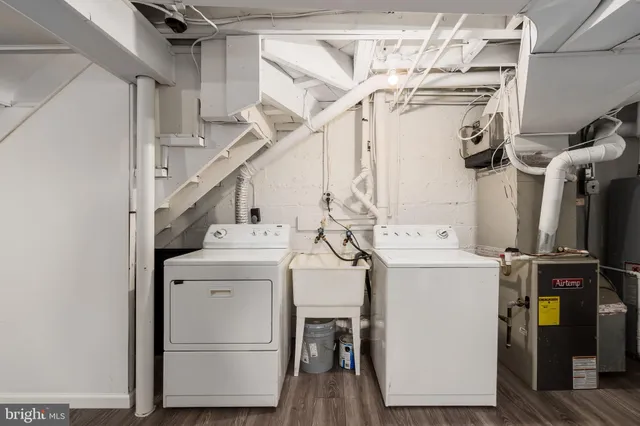 an empty room with wooden floor