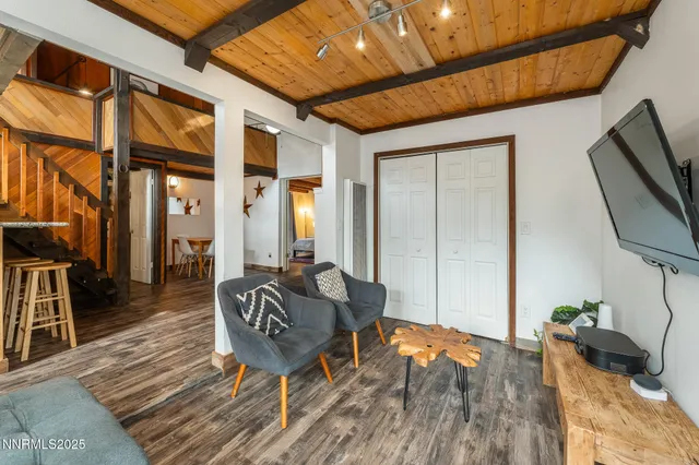 a view of a living room and bathroom