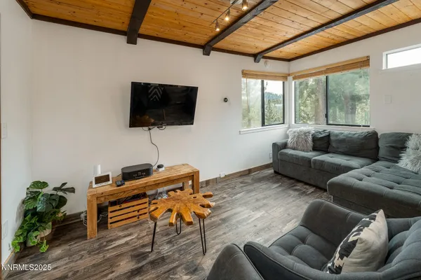 a view of a living room and bathroom
