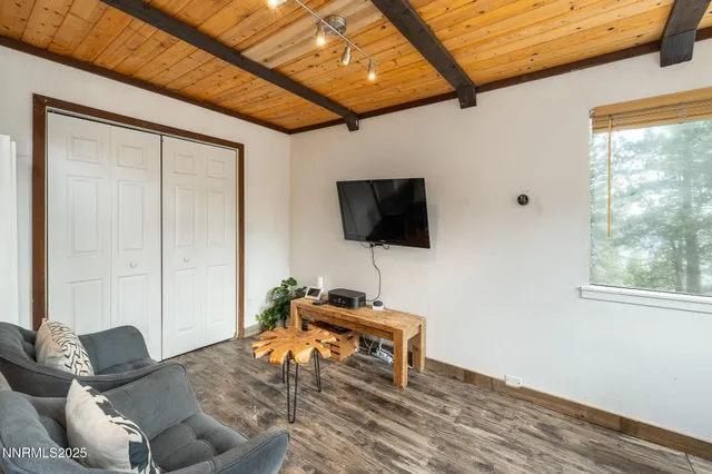 a kitchen with a sink a refrigerator and washer