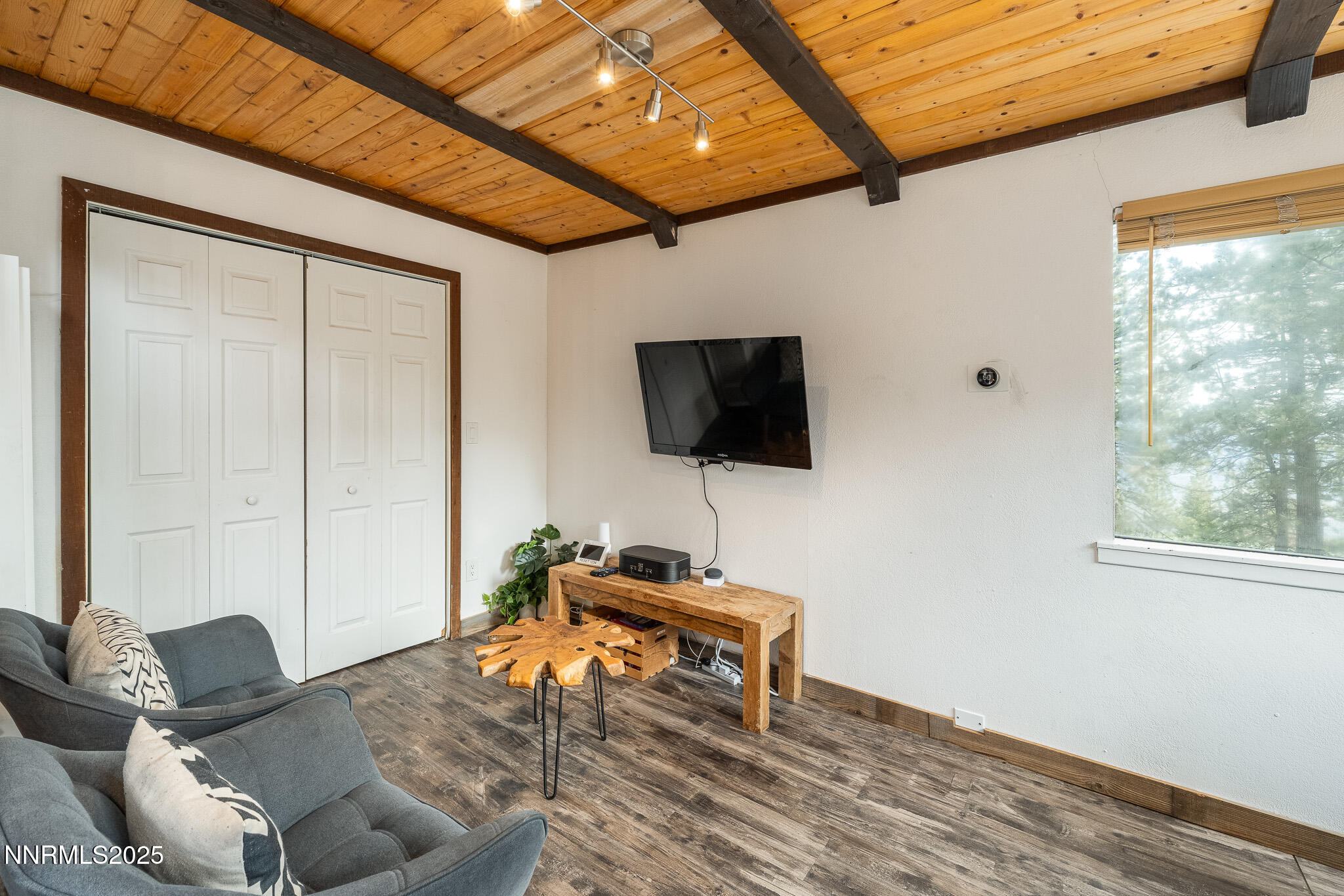 281 Orion Lane, Unit D Stateline, NV 89449 - Photo 19 of 33 a living room with furniture and a flat screen tv