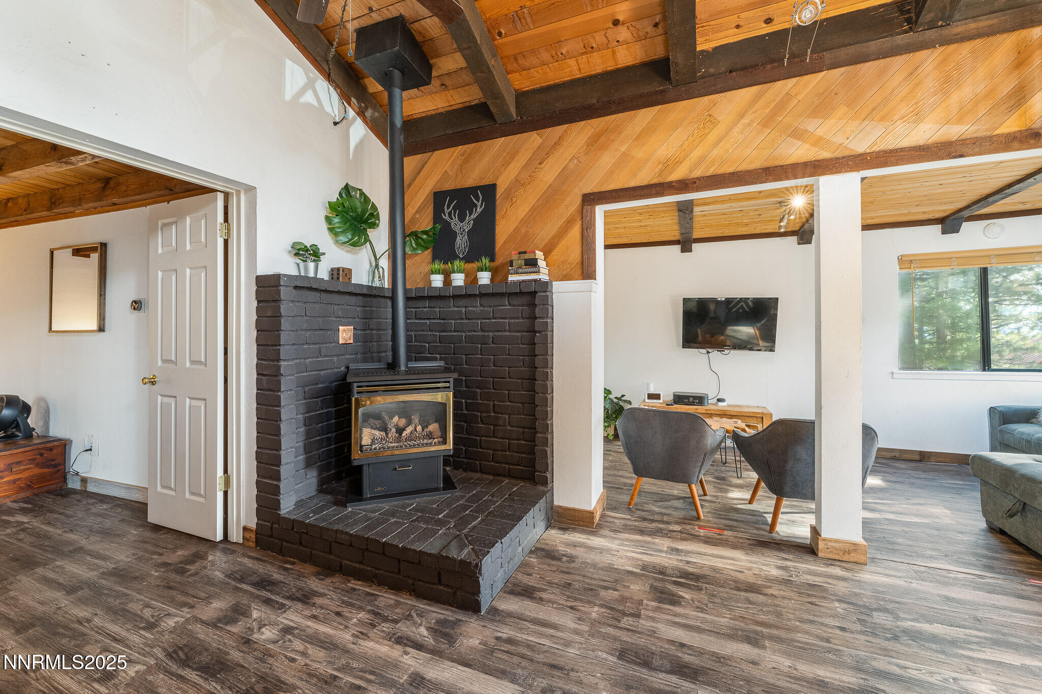 281 Orion Lane, Unit D Stateline, NV 89449 - Photo 26 of 33 a living room with furniture and a table