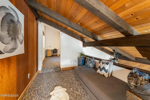 a bedroom with a bed and a table in it