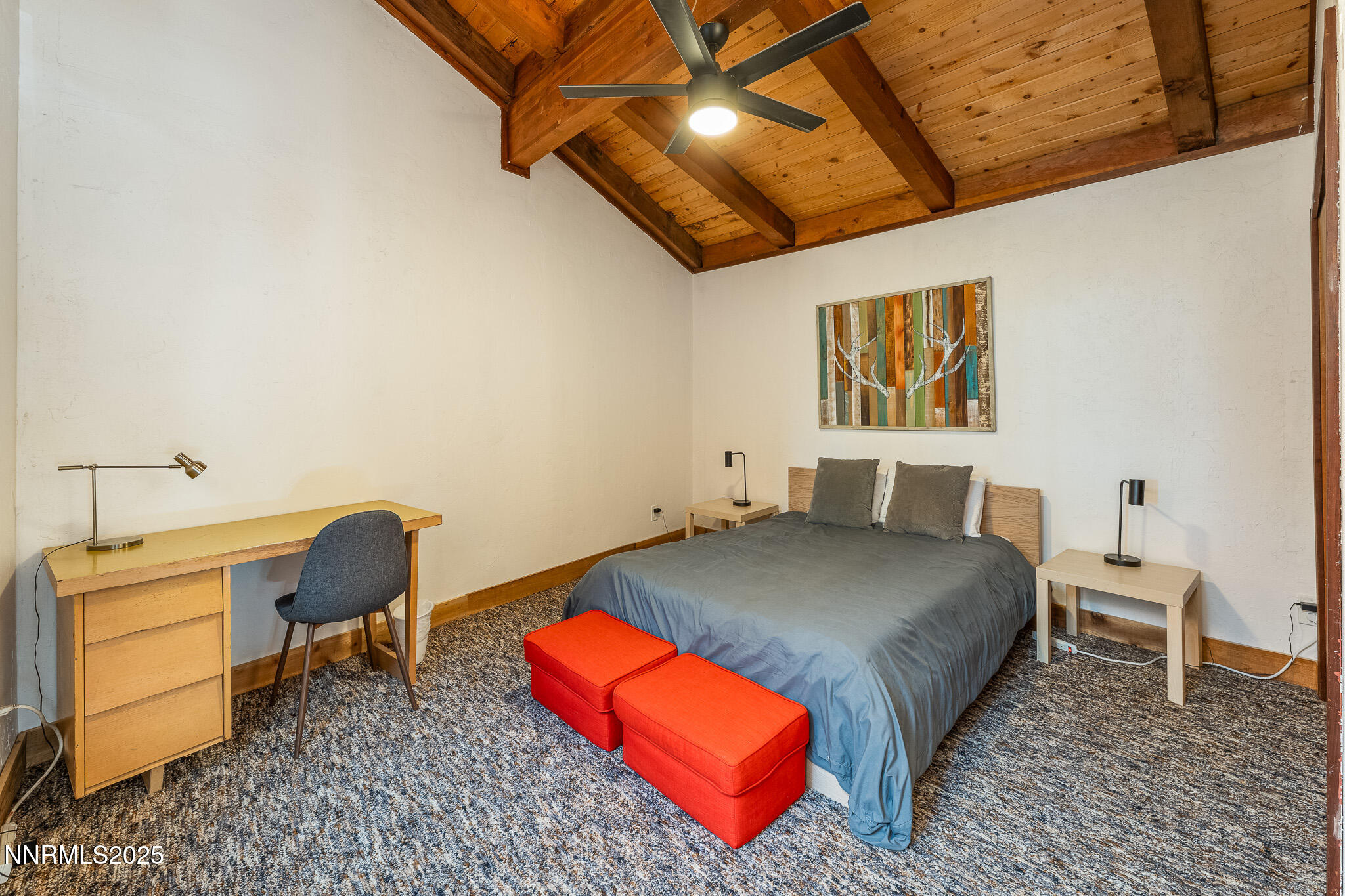 281 Orion Lane, Unit D Stateline, NV 89449 - Photo 31 of 33 a bedroom with a bed and cupboard