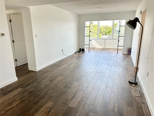 a kitchen with cabinets and appliances