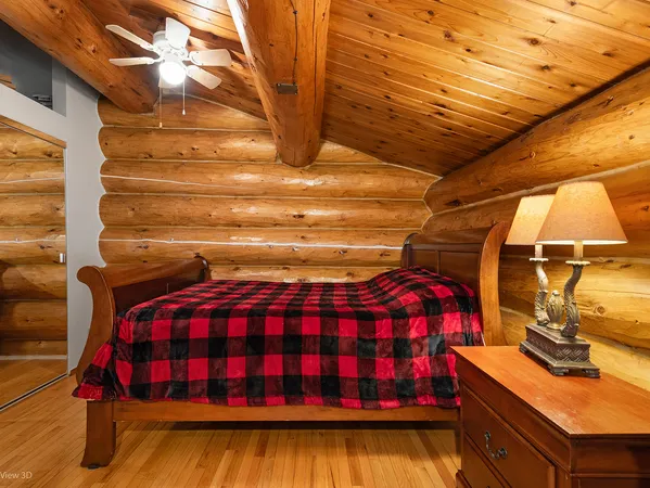 a kitchen with granite countertop a stove cabinets and refrigerator