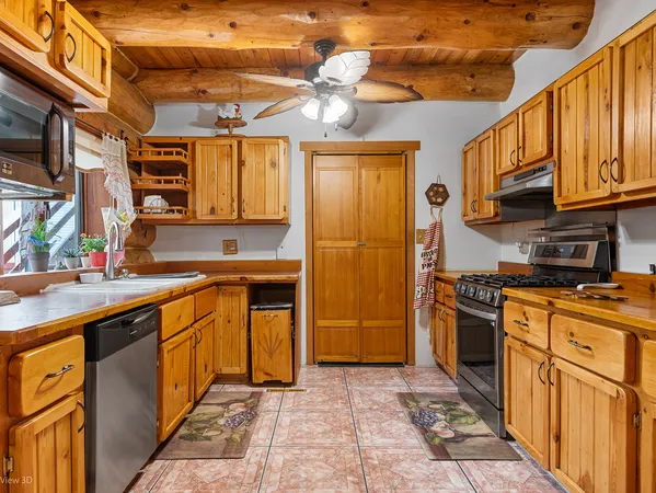 a view of a chairs and table in the patio