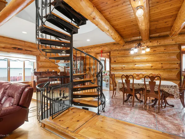 a view of outdoor space with deck and wooden floor