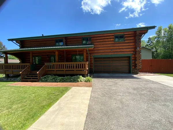 a view of outdoor space with deck and wooden floor