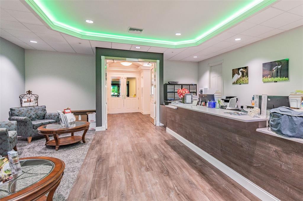 11647 Wheatfield Loop Hudson, FL 34667 - Photo 48 of 62 a living room with furniture and wooden floor