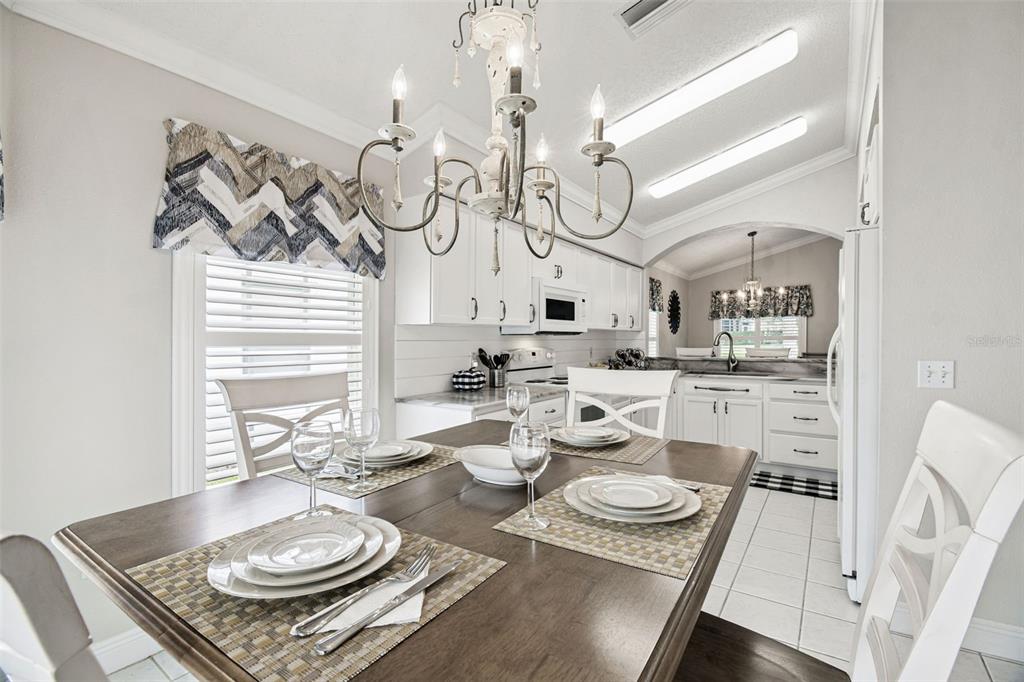 11647 Wheatfield Loop Hudson, FL 34667 - Photo 8 of 62 a very nice looking dining room with furniture