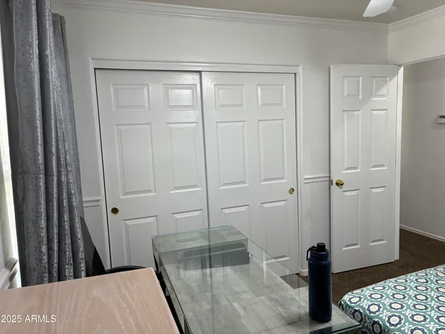 a living room with furniture and window