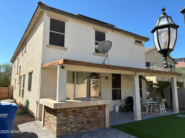 a view of a porch in front of house