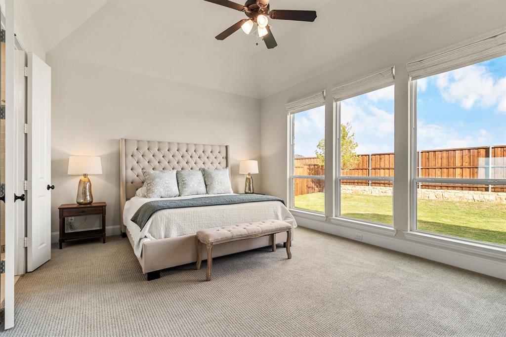 2560 Shady Trail Prosper, TX 75078 - Photo 15 of 40 a bed sitting in a bedroom next to a window