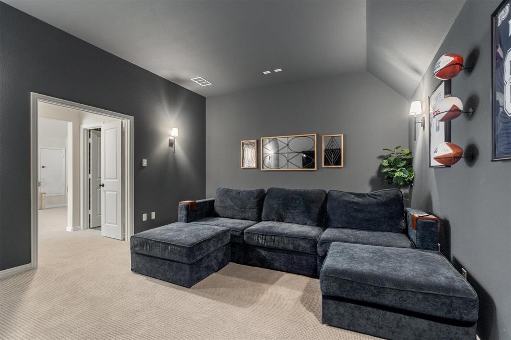 2560 Shady Trail Prosper, TX 75078 - Photo 26 of 40 a living room with furniture and a potted plant