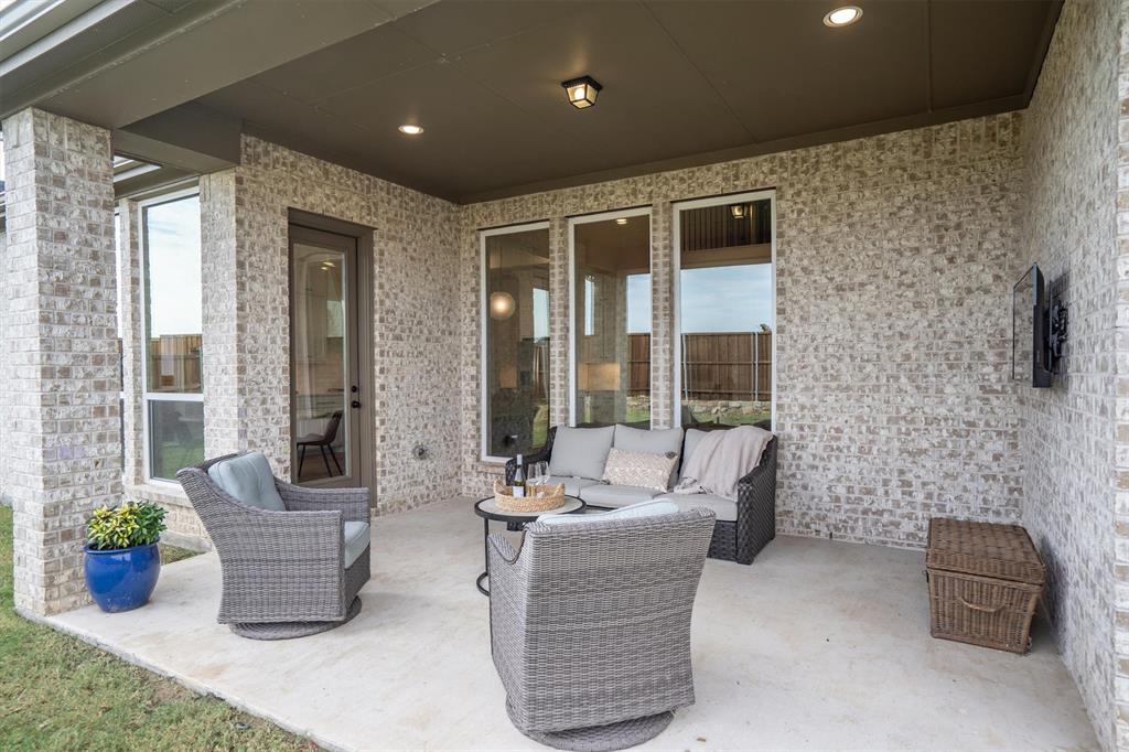 2560 Shady Trail Prosper, TX 75078 - Photo 29 of 40 a dining room with furniture and potted plants