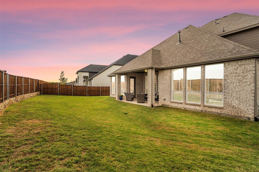 2560 Shady Trail Prosper, TX 75078 - Photo 30 of 40 a view of a house with backyard and porch