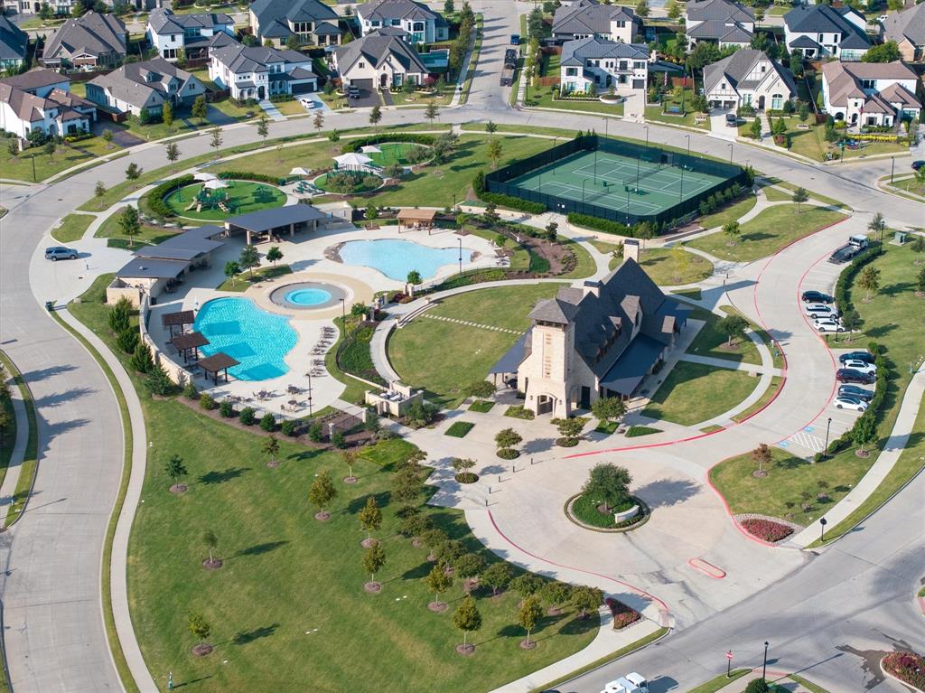 2560 Shady Trail Prosper, TX 75078 - Photo 38 of 40 an aerial view of a swimming pool with a yard and outdoor seating