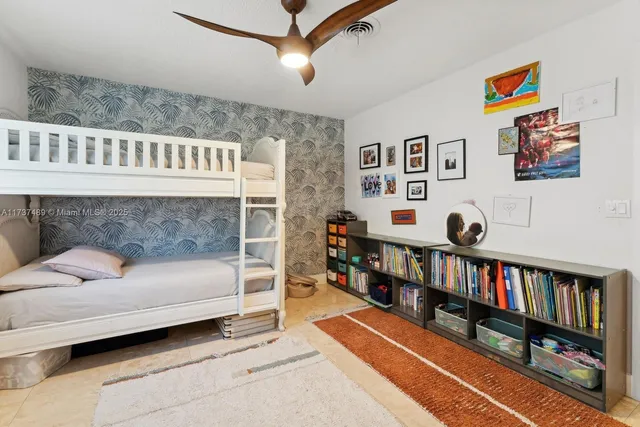 a bathroom with a sink toilet vanity and shower
