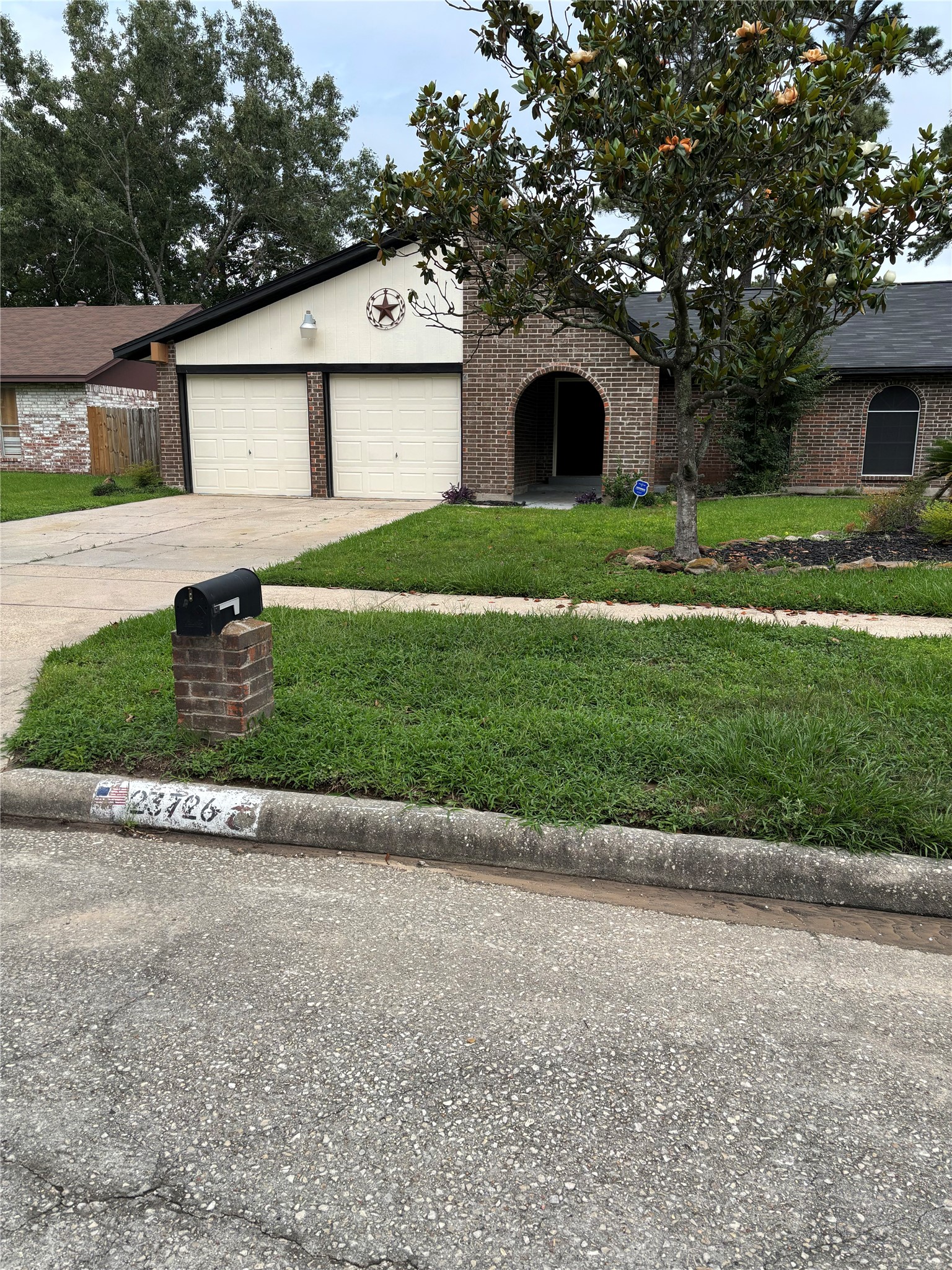 23726 Farm Hill Drive Spring, TX 77373 - Photo 1 of 11 front view of a house with a yard