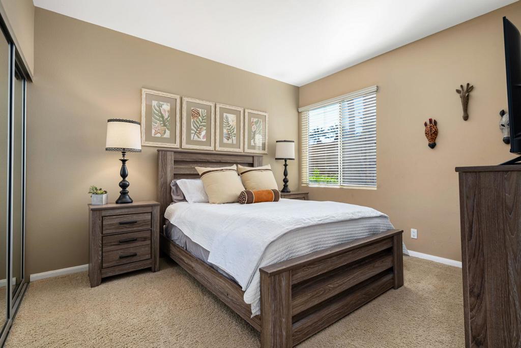 55406 Laurel La La Quinta, CA 92253 - Photo 16 of 50 a bed sitting in a bedroom next to a window