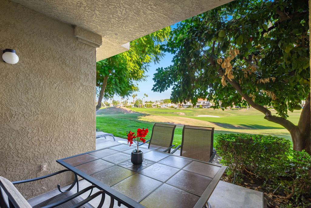 55406 Laurel La La Quinta, CA 92253 - Photo 22 of 50 a view of a dining table and chairs in the patio