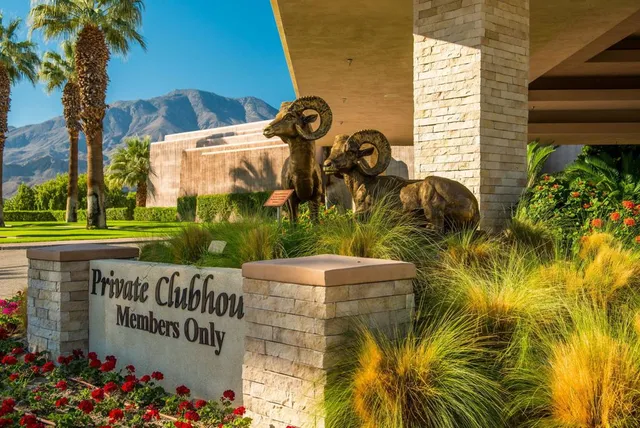swimming pool view with a lake view