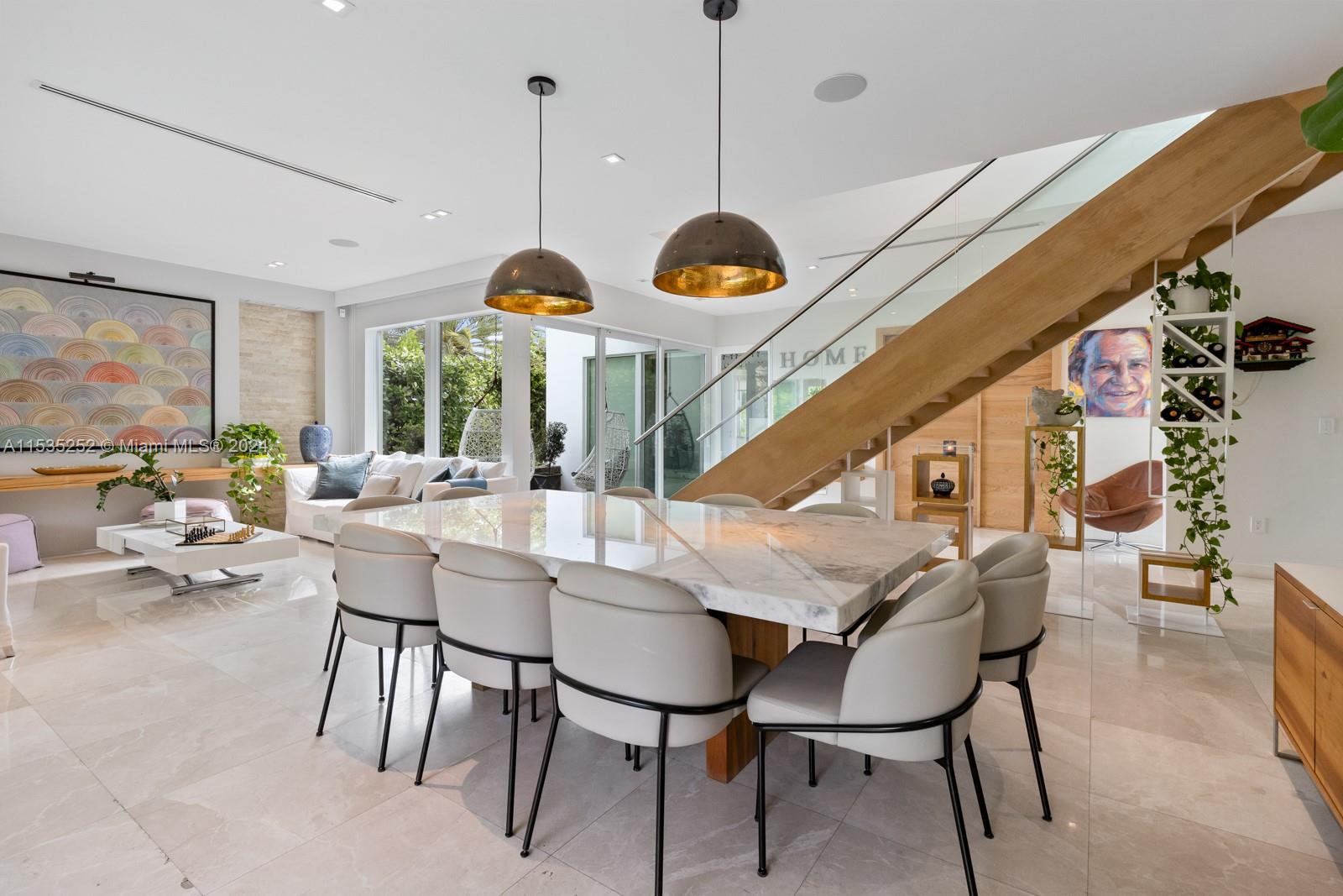381 Beechwood Drive Key Biscayne, FL 33149 - Photo 9 of 23 a view of a dining room and livingroom view