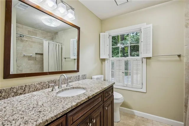 a bathroom with a sink and a shower
