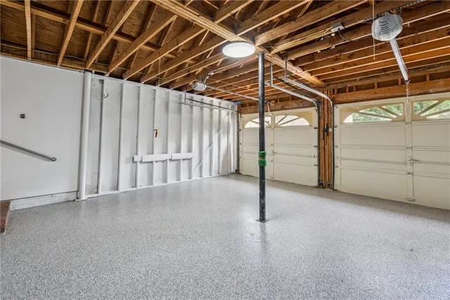 a view of a chair and table in the balcony