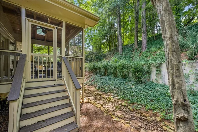 a view of a garden with a building