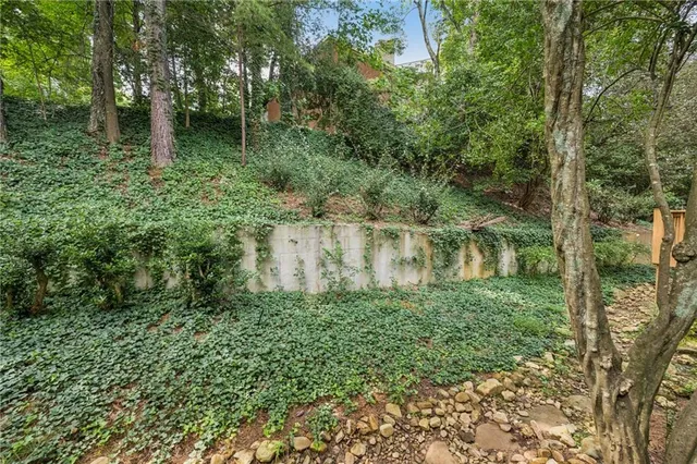 a aerial view of a house with a yard