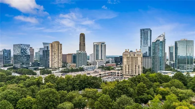 a view of a city with tall buildings