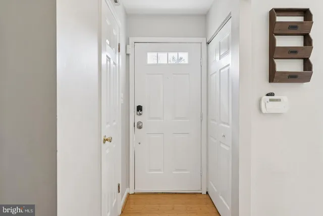 a view of a hallway with closet