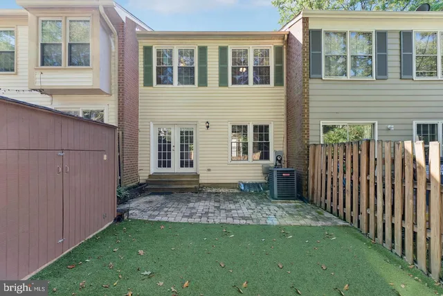 a house view with a backyard space