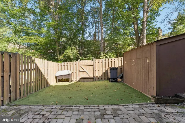 a house view with a backyard space