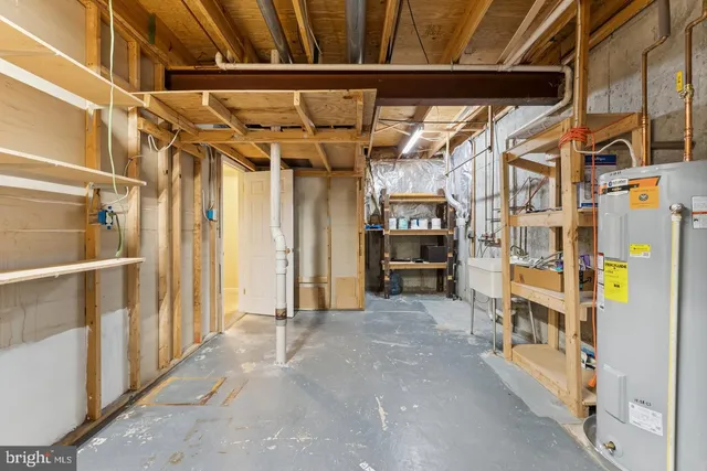 a view of an empty room with furniture