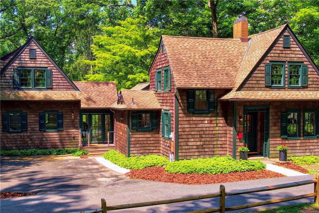 a front view of a house with garage