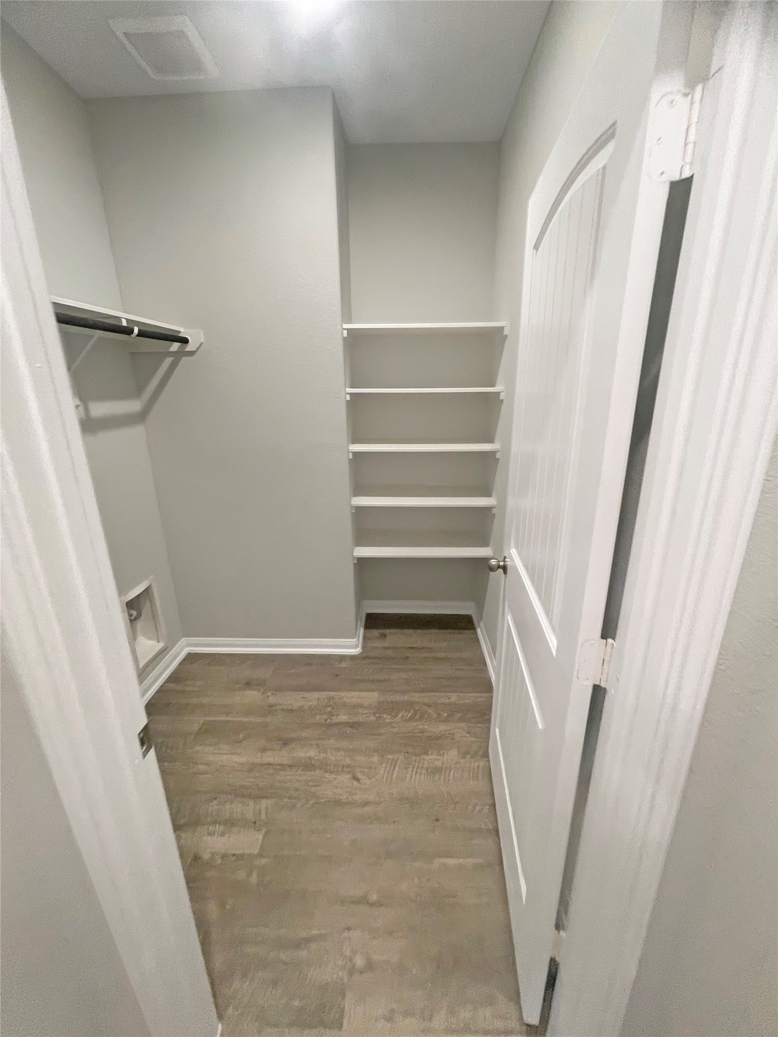 25421 Honus Wagner Way Splendora, TX 77372 - Photo 14 of 24 a view of walk in closet with empty racks
